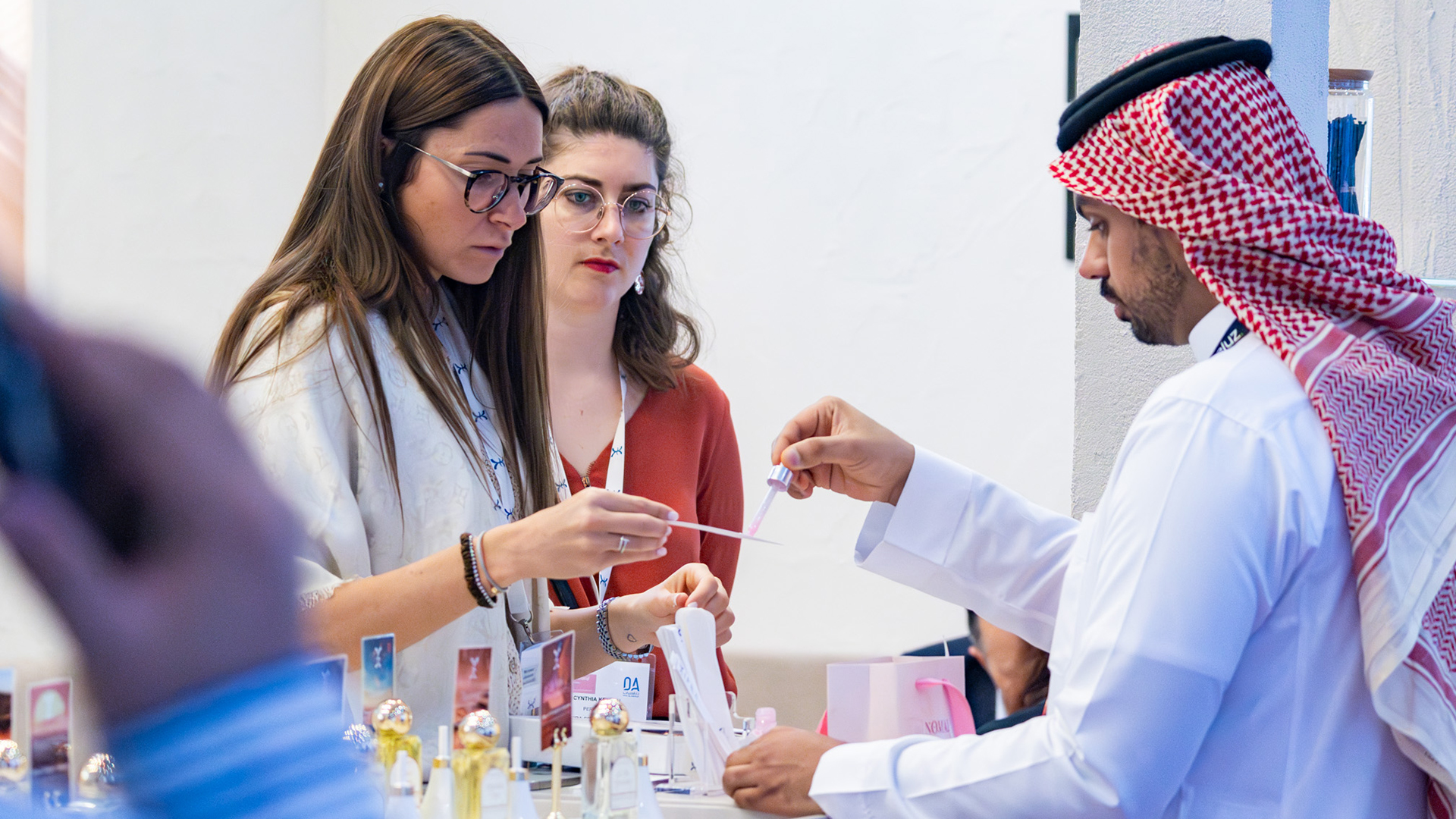 Beautyworld Riyadh - Visitor interacting with exhibtor